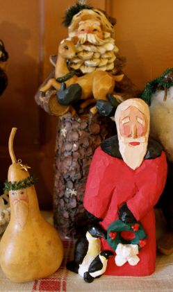 A gourd Santa, a rustic Santa, and Nickelson Claus