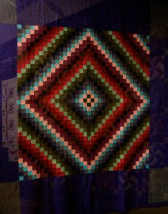 A poor photo of a fab Amish quilt