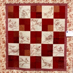A 21st-century redwork quilt, made by Nancy Dayton